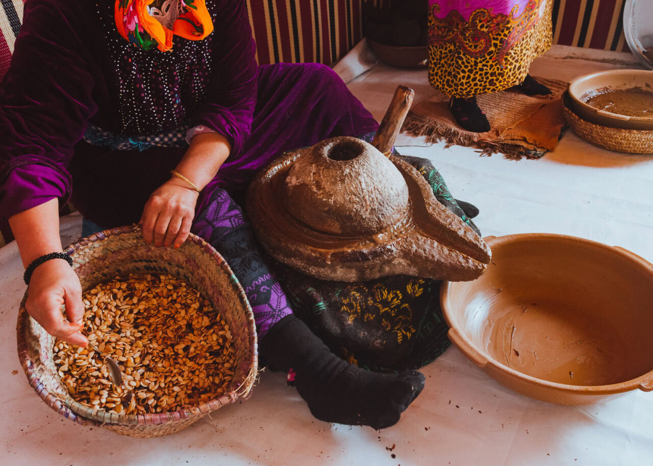 Close up of woman making Argan oil in Morocco