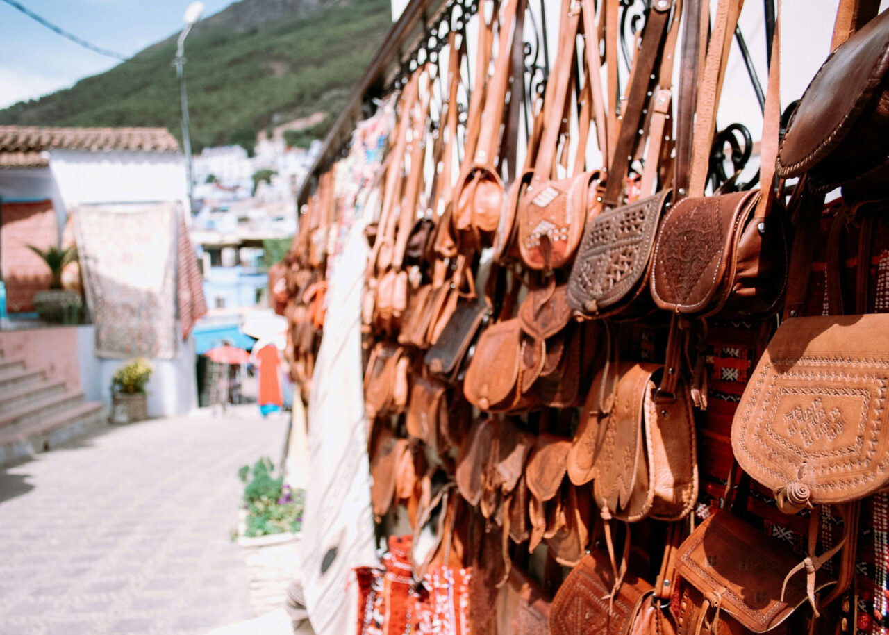 Leather bags hanging on a wall in Morocco