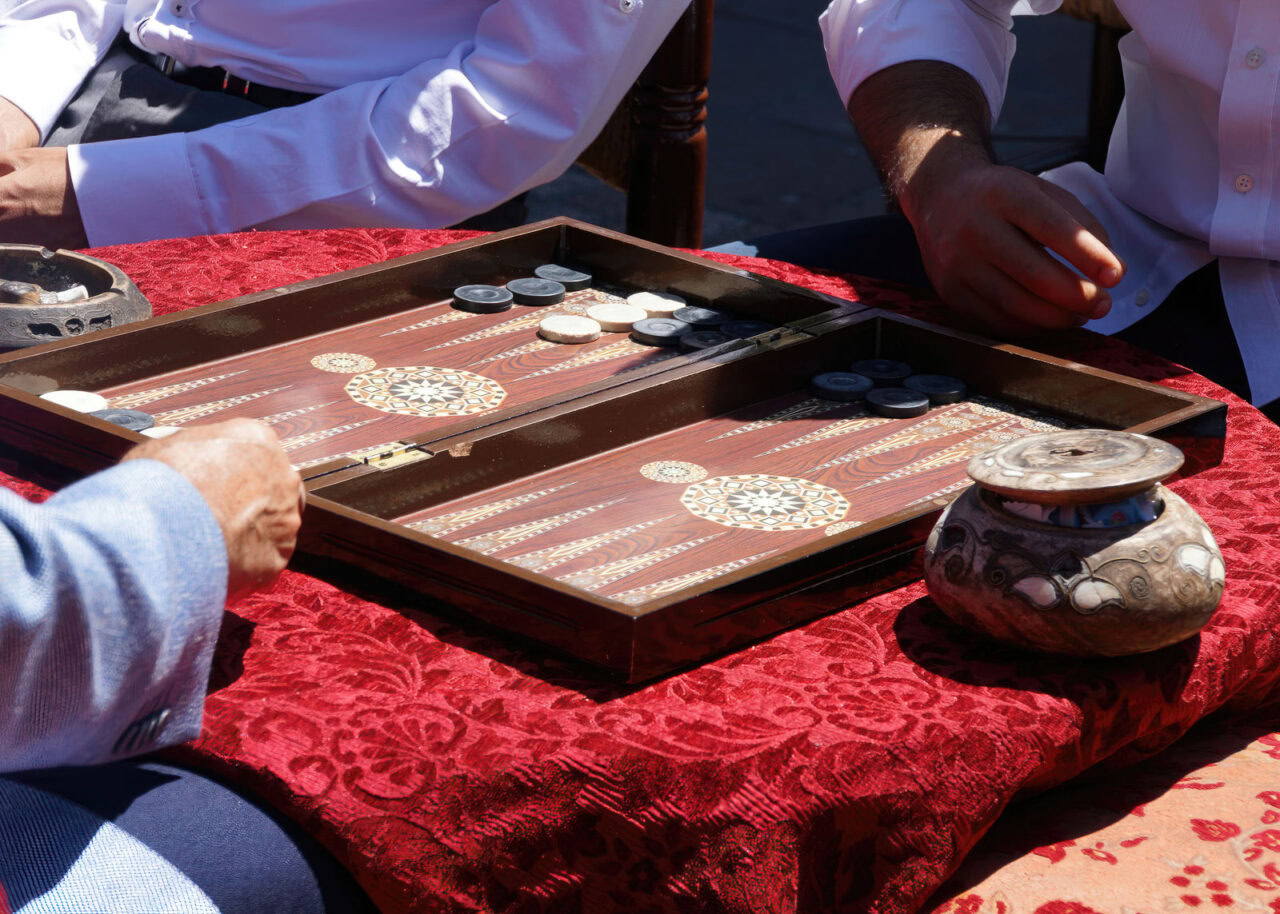 Two people playing backgammon in Turkey