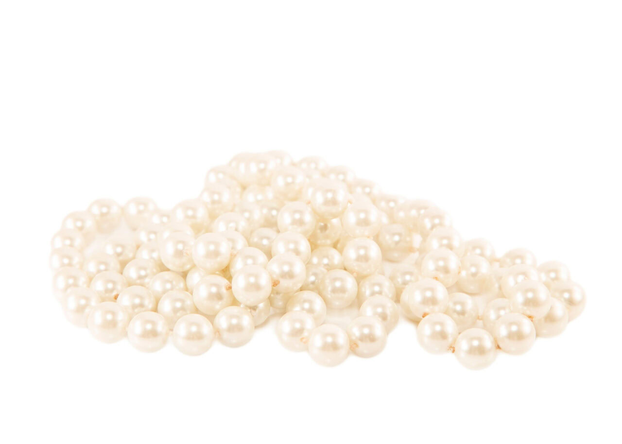 White pearls on a white background