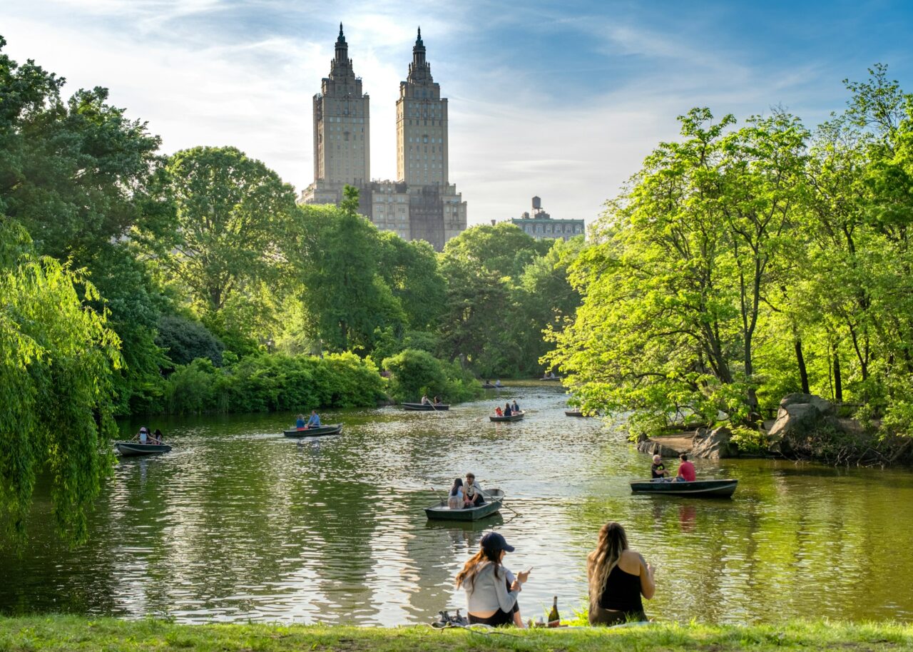 People rowing boats on the lake in Central Park